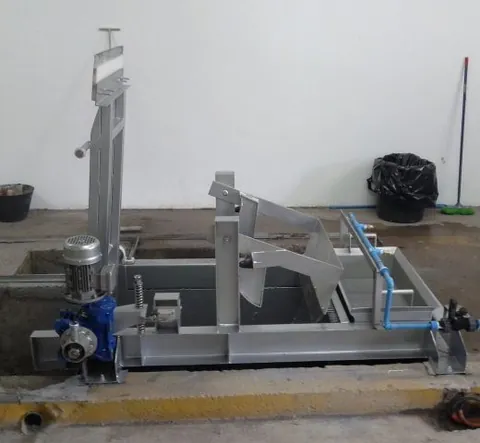 Reja circular automática con su cuba de eliminación