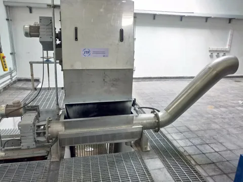 Reja automática de cadena y tornillo compactador de la Planta Guayacán, Coquimbo